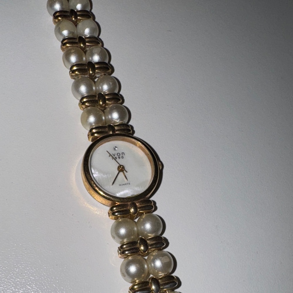 Avon Gold and White Pearl Women's Watch